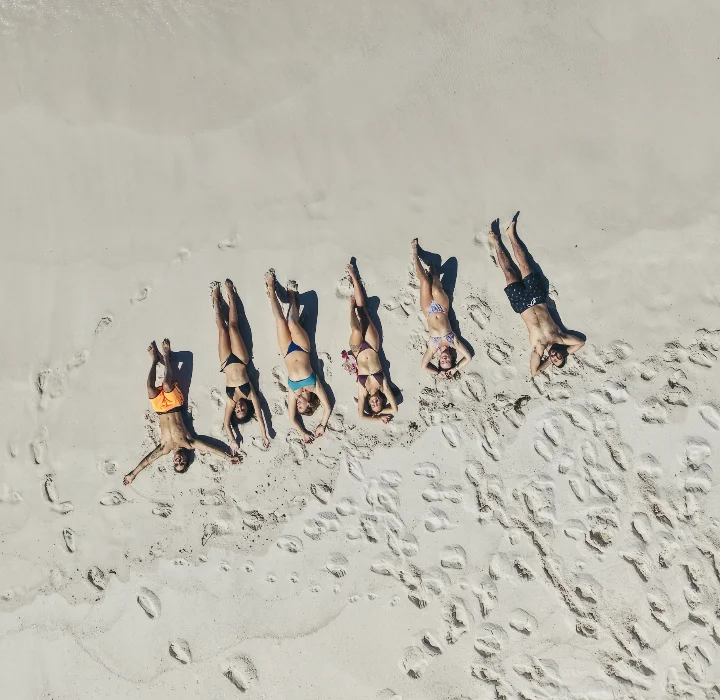 77 Tours guide with small group at Jervis Bay, New South Wales